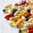 Product close-up showing capsules and natural ingredients